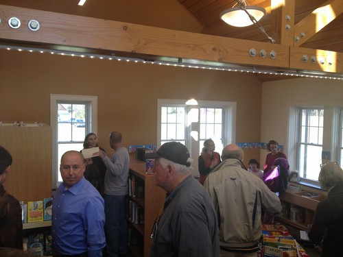 While David L. and Chip make their way to another part of the library (it is way bigger now), you can see the children's corner. As Rotarians we have requested our donation to be used to expand the children's section. We are allowed to have a plaque there in the near future.